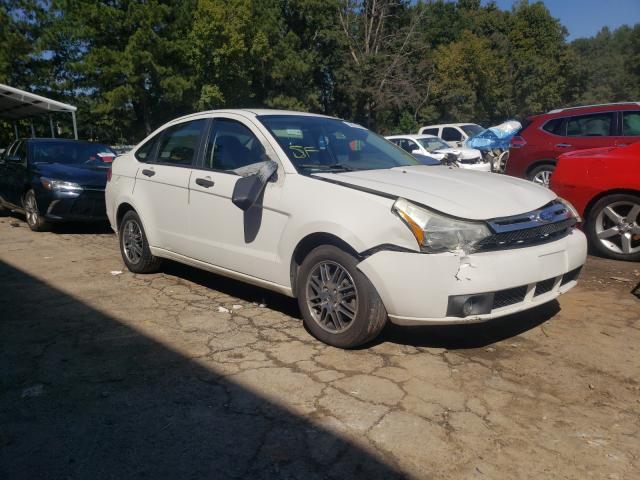 FORD FOCUS 2011 with VIN 1FAHP3FN0BW169573 - Photo from auction
