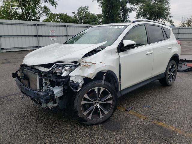 Photo 2 from auction – 2015 TOYOTA RAV4 LIMIT with VIN JTMDFREV4FD163597
