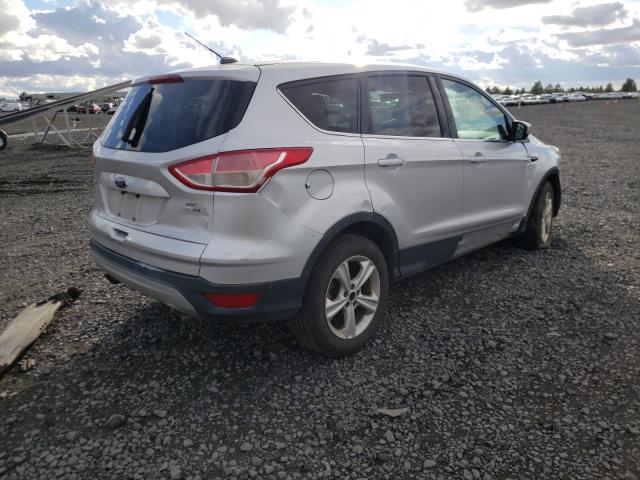 Photo 4 from auction – 2015 FORD ESCAPE SE with VIN 1FMCU9G95FUA18680