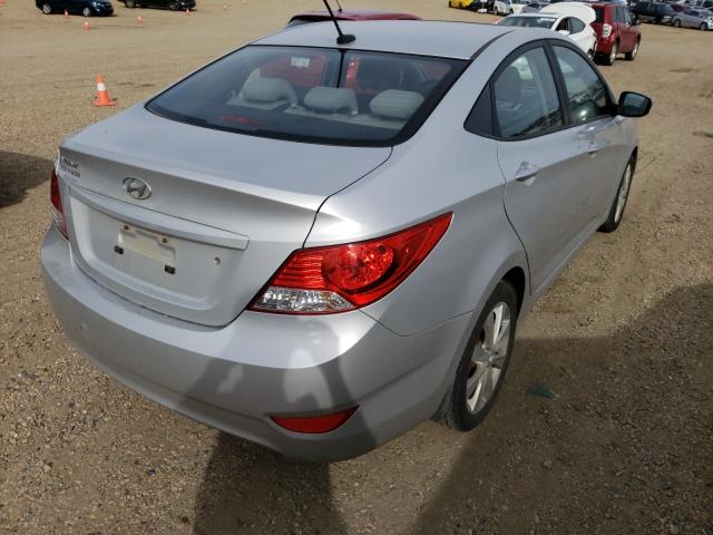 Photo 4 from auction – 2014 HYUNDAI ACCENT GLS with VIN KMHCU4AE5EU627064