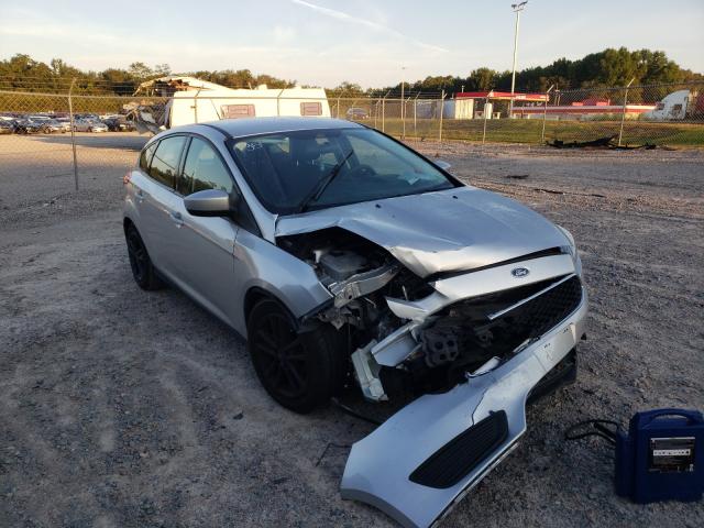 FORD FOCUS SE 2018 with VIN 1FADP3K29JL231899 - Photo from auction