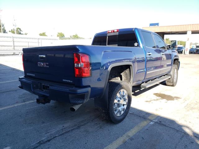 Photo 4 from auction – 2016 GMC SIERRA DEN with VIN 1GT12UEG4GF249114