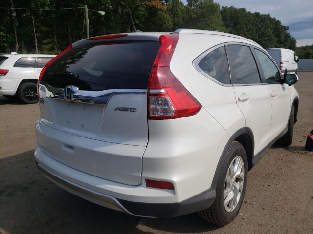 Photo 4 from auction – 2016 HONDA CR-V EXL with VIN 5J6RM4H7XGL000112