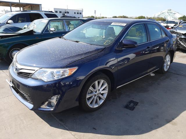 Photo 2 from auction – 2014 TOYOTA CAMRY HYBR with VIN 4T1BD1FKXEU140273