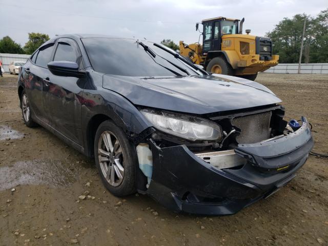 HONDA CIVIC LX 2018 with VIN 2HGFC2F54JH593263 - Photo from auction