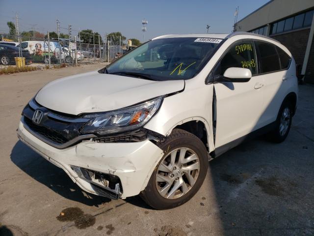 Photo 2 from auction – 2016 HONDA CR-V EXL with VIN 5J6RM4H71GL114323