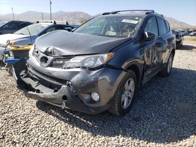 Photo 2 from auction – 2014 TOYOTA RAV4 XLE with VIN JTMRFREV4ED064959
