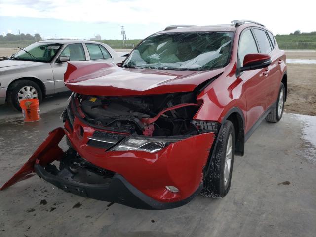 Photo 2 from auction – 2014 TOYOTA RAV4 XLE with VIN JTMRFREV7ED056418