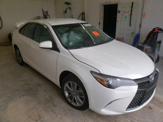 TOYOTA CAMRY LE 2016 with VIN 4T1BF1FK9GU254214 - Photo from auction