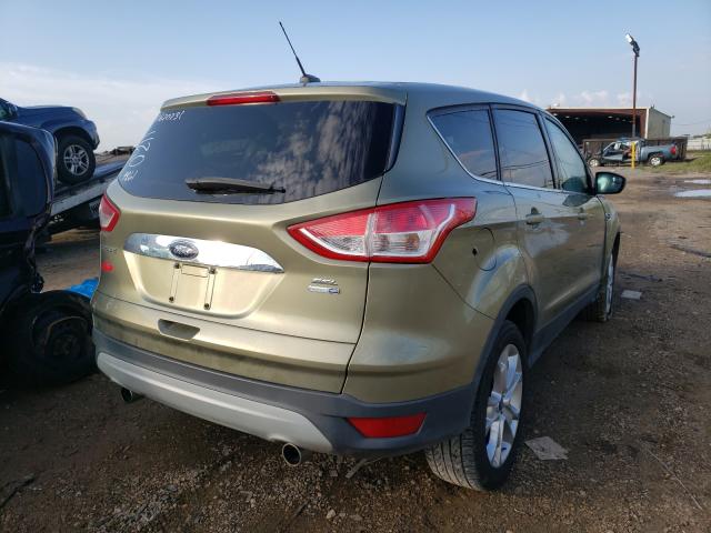 Photo 4 from auction – 2013 FORD ESCAPE with VIN 1FMCU9HX3DUB49861