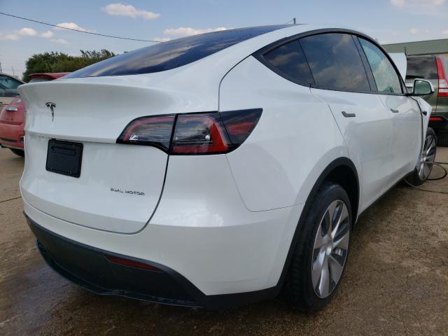 Photo 4 from auction – 2021 TESLA MODEL Y with VIN 5YJYGDEE7MF245282