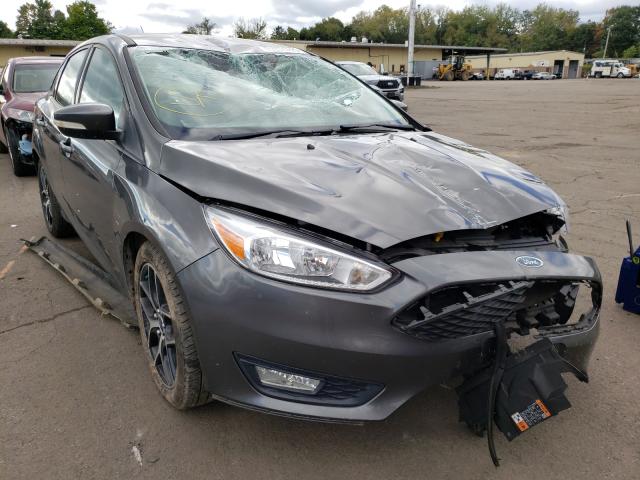 FORD FOCUS SE 2015 with VIN 1FADP3F25FL304882 - Photo from auction