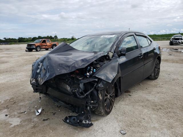 Photo 2 from auction – 2014 TOYOTA COROLLA L with VIN 2T1BURHE6EC045992