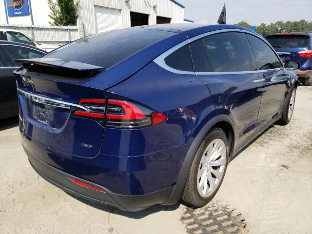 Photo 4 from auction – 2018 TESLA MODEL X with VIN 5YJXCDE25JF129555