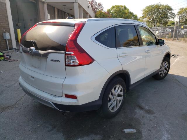 Photo 4 from auction – 2016 HONDA CR-V EXL with VIN 5J6RM4H71GL114323