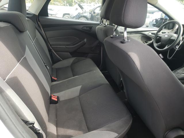 Photo 6 from auction – 2013 FORD FOCUS S with VIN 1FADP3E2XDL360847