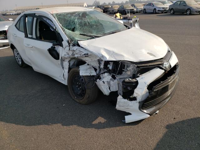 TOYOTA COROLLA L 2019 with VIN 5YFBURHE7KP931248 - Photo from auction