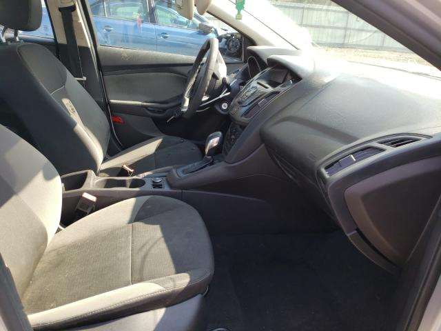 Photo 5 from auction – 2013 FORD FOCUS S with VIN 1FADP3E2XDL360847