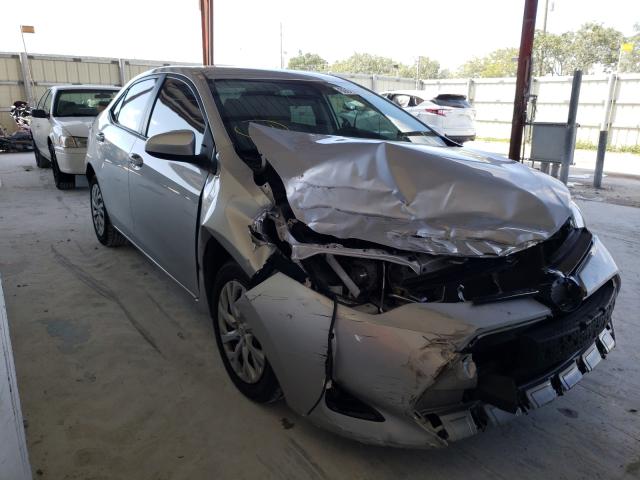 TOYOTA COROLLA L 2018 with VIN 5YFBURHE3JP779127 - Photo from auction