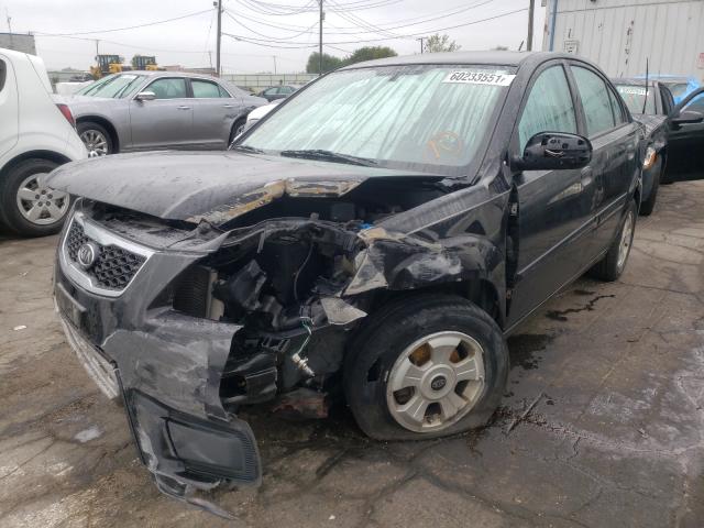 Photo 2 from auction – 2011 KIA RIO BASE with VIN KNADH4A32B6734825