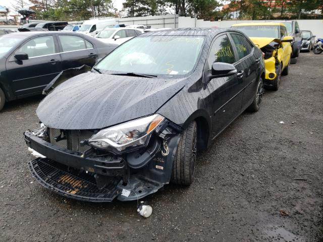 Photo 2 from auction – 2014 TOYOTA COROLLA L with VIN 2T1BURHEXEC133024