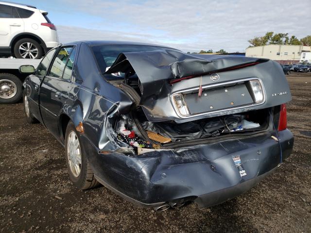 Photo 9 from auction – 2004 CADILLAC DEVILLE with VIN 1G6KD54Y04U115113