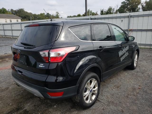 Photo 4 from auction – 2017 FORD ESCAPE SE with VIN 1FMCU9GD0HUD33765