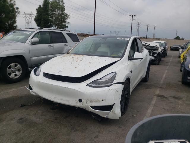 Photo 2 from auction – 2021 TESLA MODEL Y with VIN 5YJYGDEE8MF228460