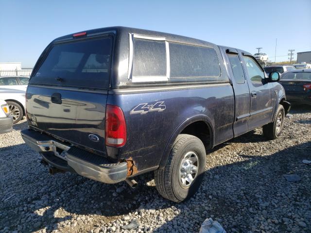 Photo 4 from auction – 2002 FORD F150 with VIN 2FTPX18L22CA64695