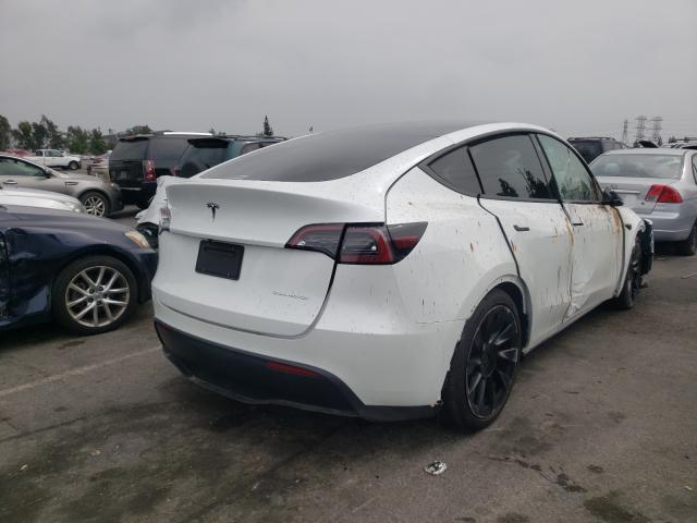 Photo 4 from auction – 2021 TESLA MODEL Y with VIN 5YJYGDEE8MF228460