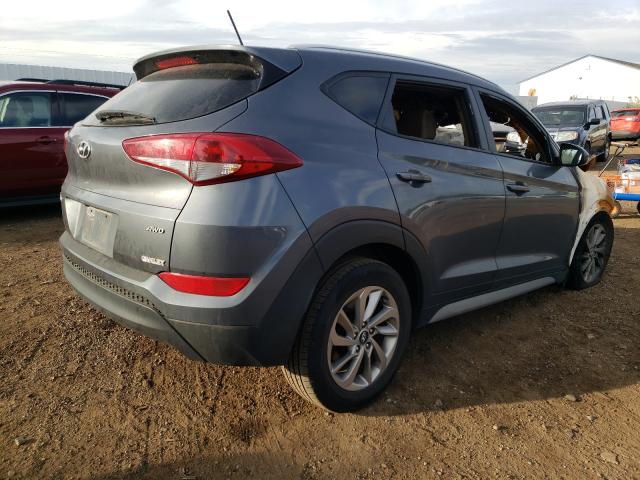 Photo 4 from auction – 2017 HYUNDAI TUCSON LIM with VIN KM8J3CA47HU468354