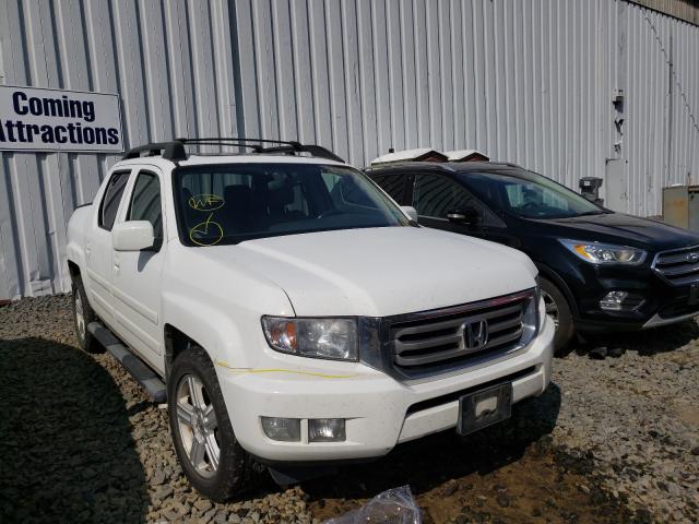 Photo 9 from auction – 2013 HONDA RIDGELINE with VIN 5FPYK1F58DB014894