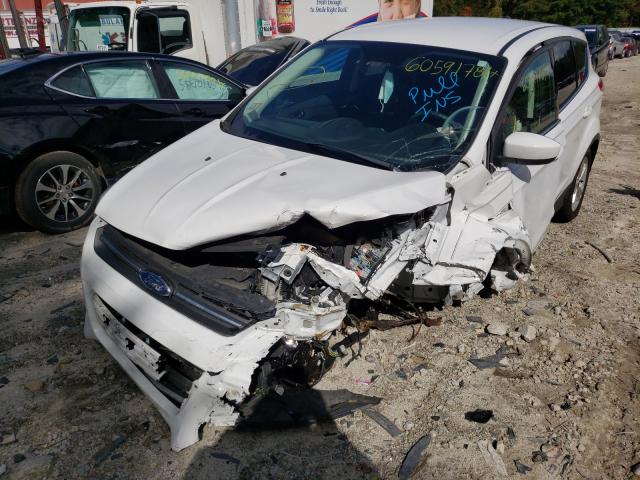 Photo 2 from auction – 2016 FORD ESCAPE SE with VIN 1FMCU9GX8GUB85146