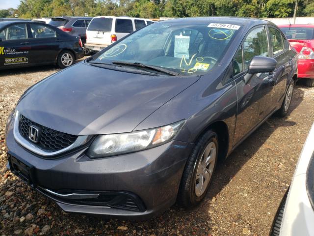 Photo 2 from auction – 2014 HONDA CIVIC LX with VIN 19XFB2F52EE209967