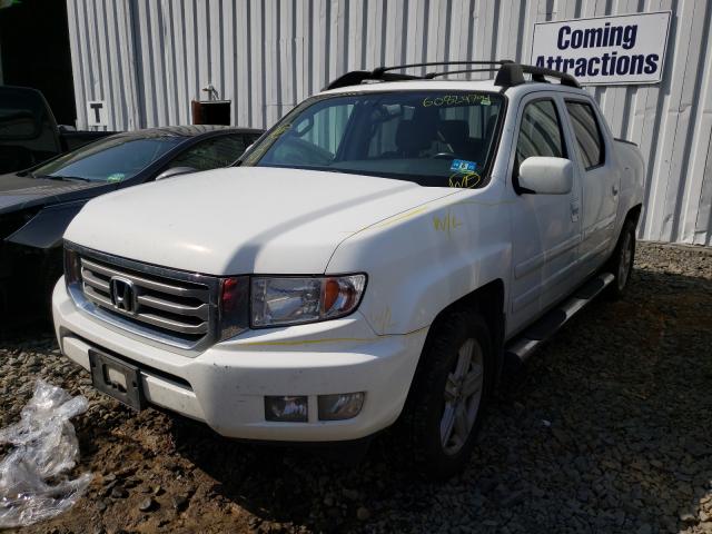 Photo 2 from auction – 2013 HONDA RIDGELINE with VIN 5FPYK1F58DB014894