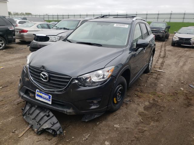 Photo 4 from auction – 2016 MAZDA CX-5 TOURI with VIN JM3KE4CY9G0772050