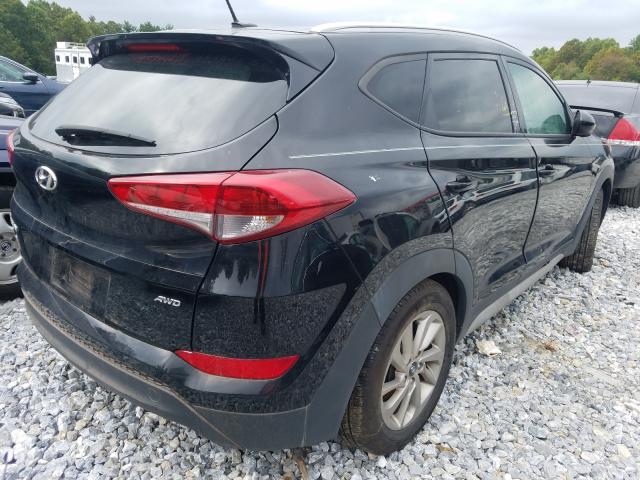 Photo 4 from auction – 2017 HYUNDAI TUCSON LIM with VIN KM8J3CA47HU538189