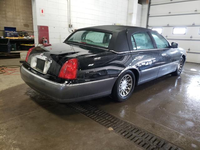 Photo 4 from auction – 2002 LINCOLN TOWN CAR S with VIN 1LNHM82WX2Y635928