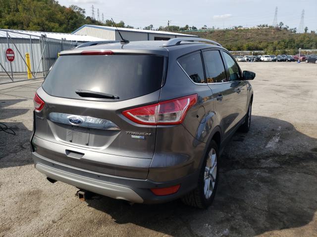 Photo 4 from auction – 2014 FORD ESCAPE with VIN 1FMCU9J99EUB25335