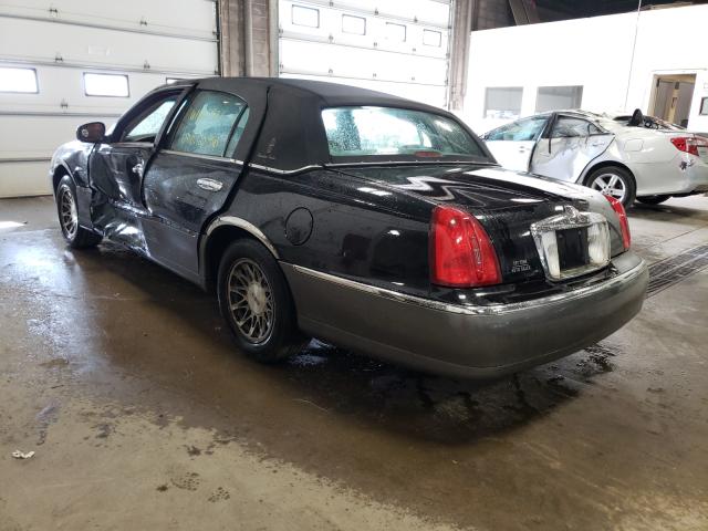 Photo 3 from auction – 2002 LINCOLN TOWN CAR S with VIN 1LNHM82WX2Y635928
