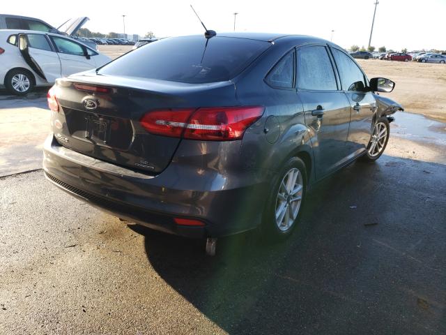 Photo 4 from auction – 2016 FORD FOCUS SE with VIN 1FADP3F23GL389805