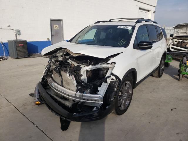 Photo 2 from auction – 2019 HONDA PASSPORT E with VIN 5FNYF7H58KB009317