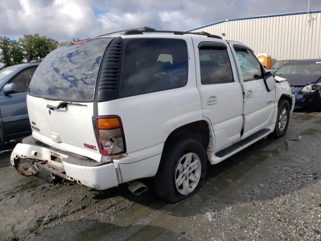 Photo 4 from auction – 2002 GMC DENALI with VIN 1GKEK63UX2J228090