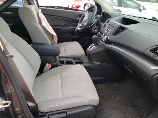 Photo 5 from auction – 2015 HONDA CR-V LX with VIN 5J6RM4H30FL057138