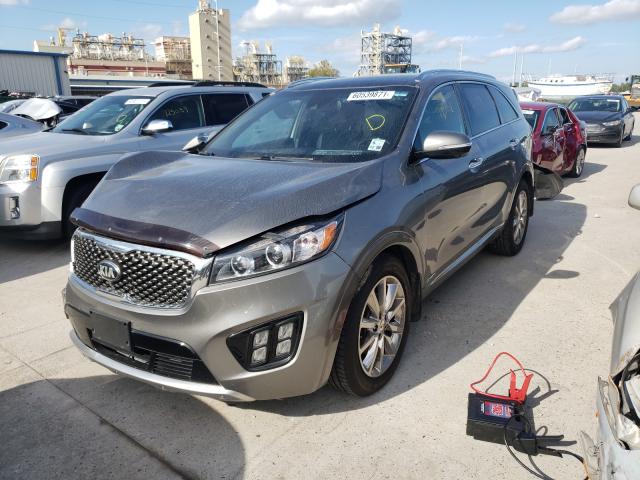 Photo 2 from auction – 2016 KIA SORENTO SX with VIN 5XYPKDA53GG012075