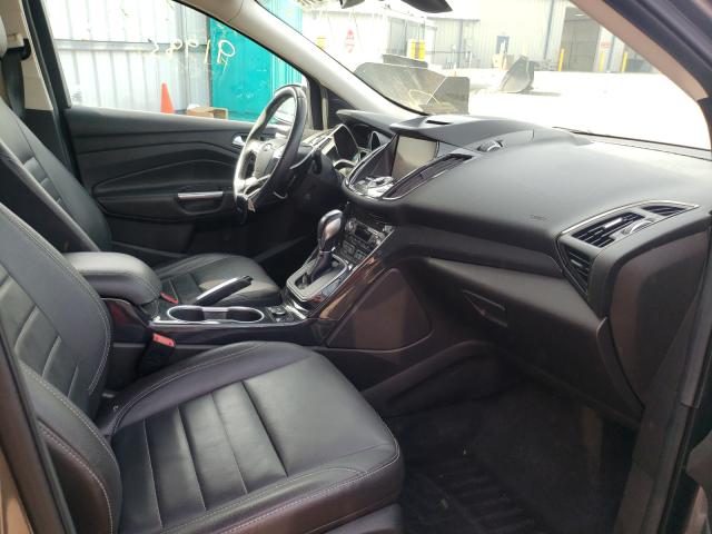 Photo 5 from auction – 2014 FORD ESCAPE with VIN 1FMCU9J99EUB25335