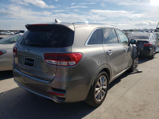 Photo 4 from auction – 2016 KIA SORENTO SX with VIN 5XYPKDA53GG012075