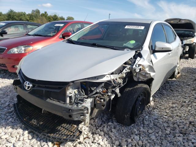 Photo 2 from auction – 2014 TOYOTA COROLLA L with VIN 2T1BURHEXEC101447
