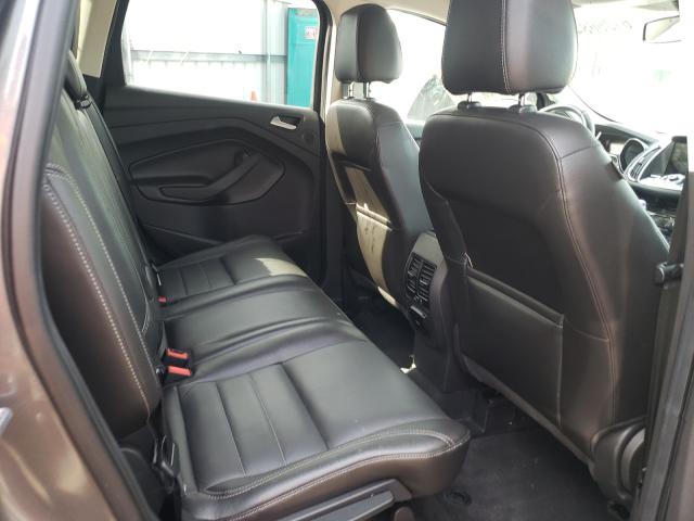 Photo 6 from auction – 2014 FORD ESCAPE with VIN 1FMCU9J99EUB25335
