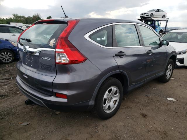 Photo 4 from auction – 2015 HONDA CR-V LX with VIN 5J6RM4H30FL057138